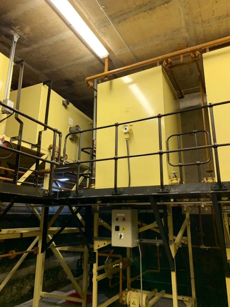 One of the red-diesel fuel tanks that feed a generator.